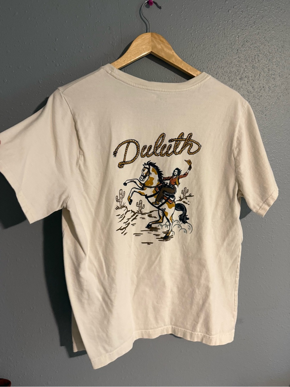 Duluth Trading Co Cream Short Sleeve Tee with Rodeo Horse Graphic